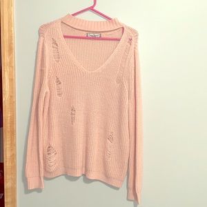 Distressed cut out sweater